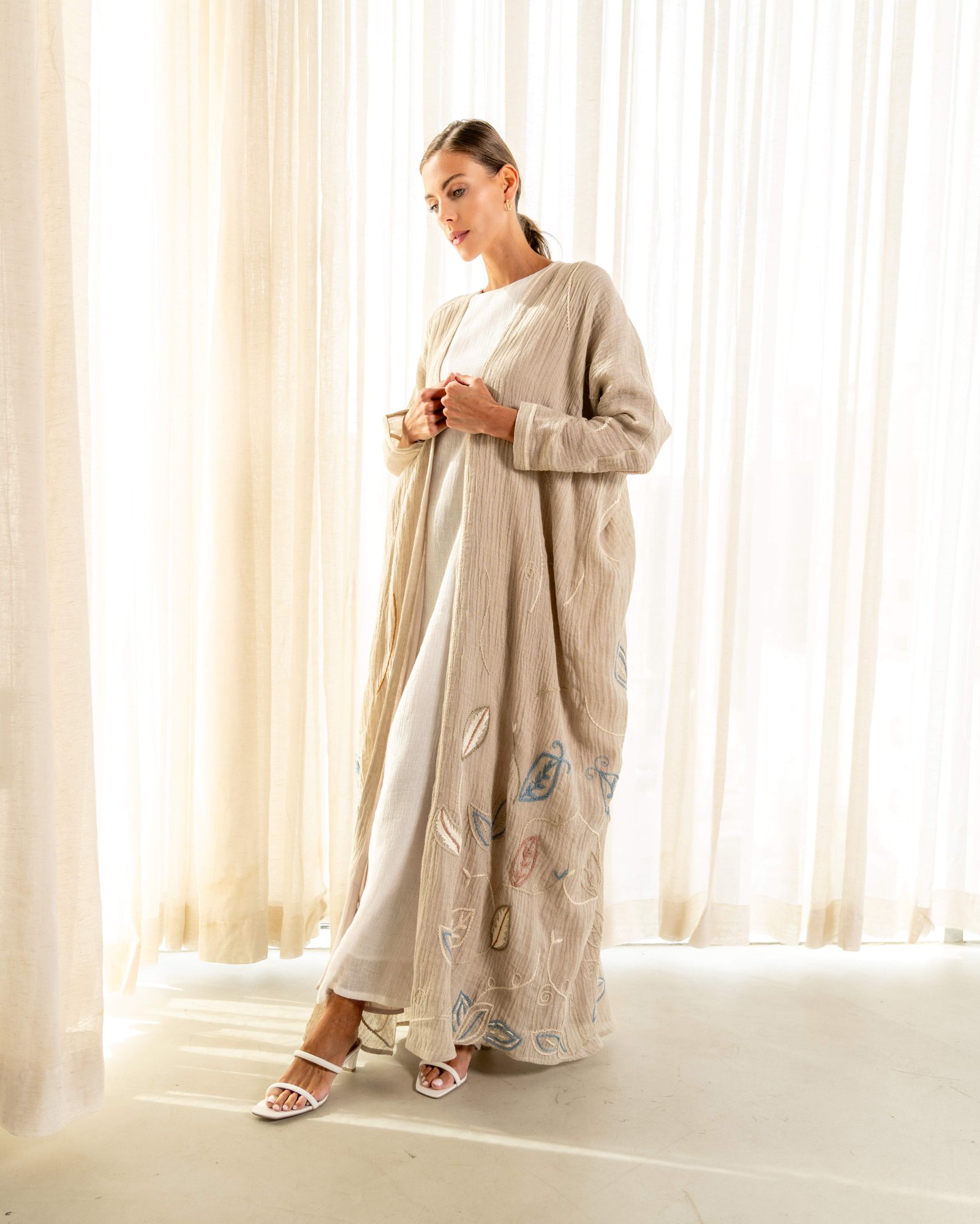 linen abaya with hand embroidery on the bottom - Image 1