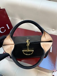 قوتشي - صورة 3