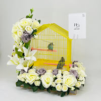 A pair of budgies with a cage decorated with colorful artificial flowers-219 - Image 3