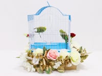 Lovebirds With A Cage Decorated With Colorful Roses - Image 1