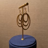 54 # - loops earrings - صورة 5