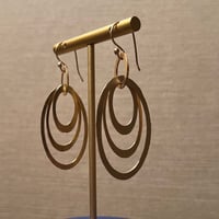 54 # - loops earrings - صورة 6