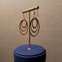 54 # - loops earrings - صورة 4