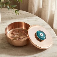 BLUE EYE ROUND METAL CONTAINER - صورة 1