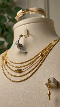 طقم البقشي عيار 21 - صورة 2
