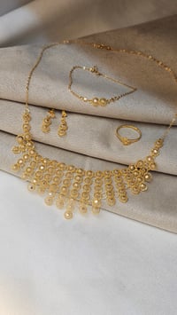 طقم ذهب عيار 21 شبكة - صورة 2