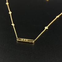 عقد مسيكا ذهبي الفريم - صورة 1