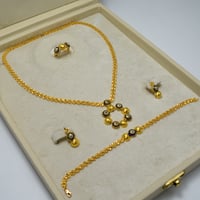 طقم نورا ذهب 21 - صورة 1