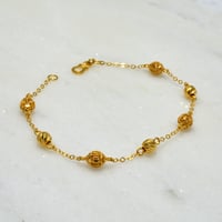 سوار المنثوره ذهب 21 - صورة 1
