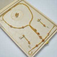 طقم دوريكا ذهب 18 - صورة 1
