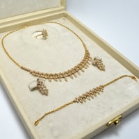 طقم ذهب 18 - صورة 1