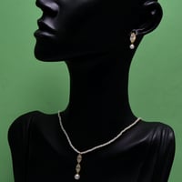 عقد و حلق لؤلؤ طبيعي زراعي ذهب 18 - صورة 1