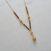 عقد نوارة ذهب 21 - صورة 1