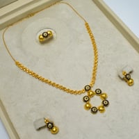 نص طقم نورا ذهب 21 - صورة 1