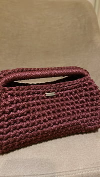 مَيسم CLUTCH - صورة 1