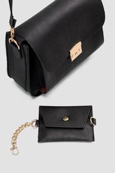 حقيبة سوداء مفصلة بتصميم محفظة نسائية