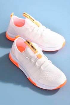 حذاء رياضة برتقالي أبيض للجنسين