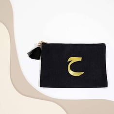 حقيبة بحرف عربي أسود من آرال