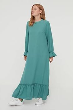فستان طويل أخضر فاتح بأطراف مكشكشة نسائي