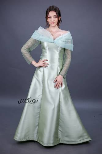 فستان سهرة تفتة على تل صدر واكمام