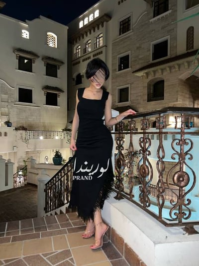 فستان اسود بريش 