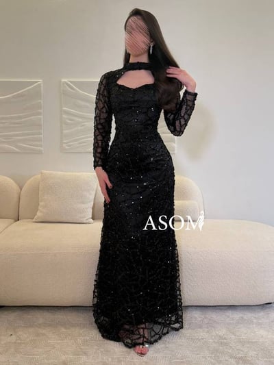 فستان منيره اسود