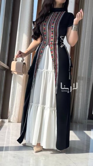 جلابية سوداء مزينة بنقشة السدو