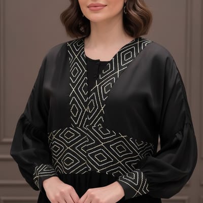 كارديجان طويل أسود بتطريزات راقية وتصميم عصري