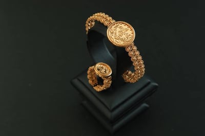 سواره +خاتم ذهب صافي عيار21 طبعه جنيه عثماني الوزن 23.62 تقريبا