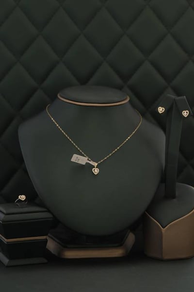 نص طقم(اطفال) اصفر تصميم الماس عيار18 الوزن 2.75