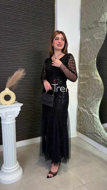 فستان سهرة مميز بكسرات 