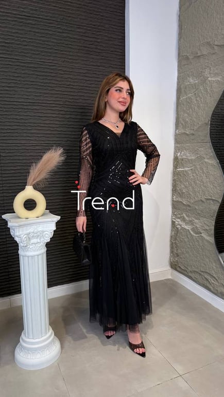 فستان سهرة مميز بكسرات 