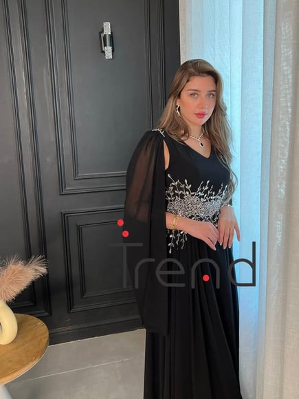فستان سهرة بأكمام