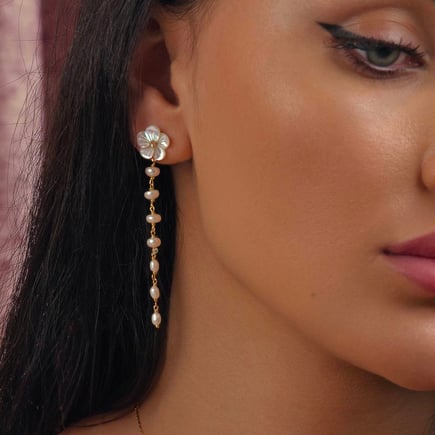 Rihanna earrings |  18K gold and diamonds