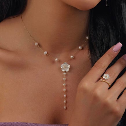 Rihanna necklace |  18K gold and diamonds