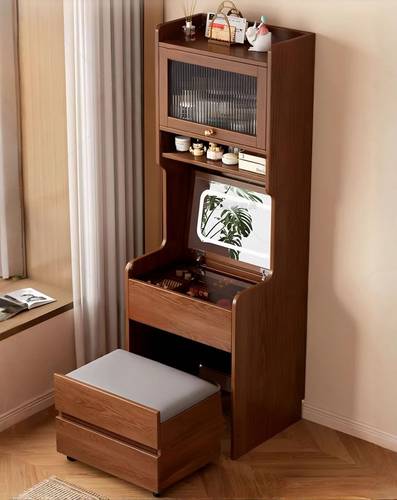 A dressing table with a built-in chair