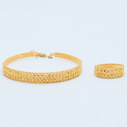 Gold bracelet and ring set 