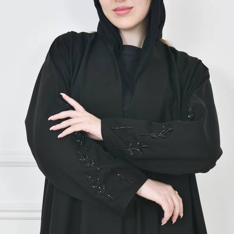 عباية لف سوداء نص كلوش بشك عى جانبي العباية والاكمام