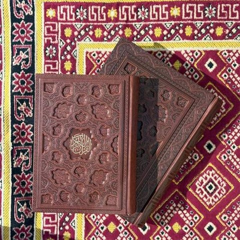 مصحف جلد حفر بني -  (17*24)