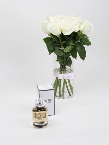 A distinctive vase and Givenchy L'Interdit perfume for women