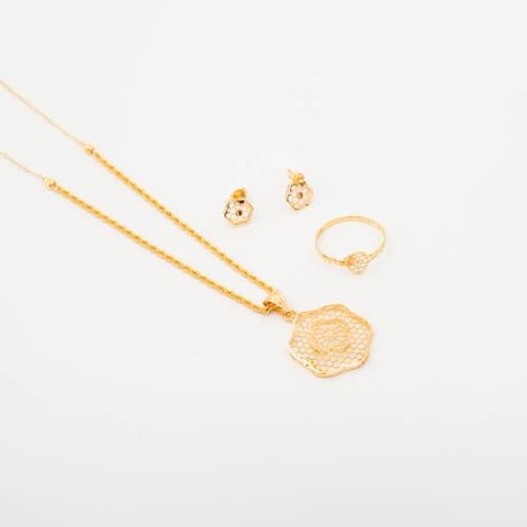 نص طقم من كولكشن المنثوره شكل الورده B عيار21