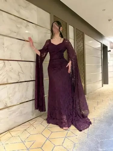 فستان سهرة دانتيل بنفسجي باكمام طويلة