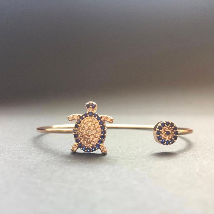 متجر الحلي - إسورة السلحفة (على الجنب)Trinkets boutique- turtle bracel