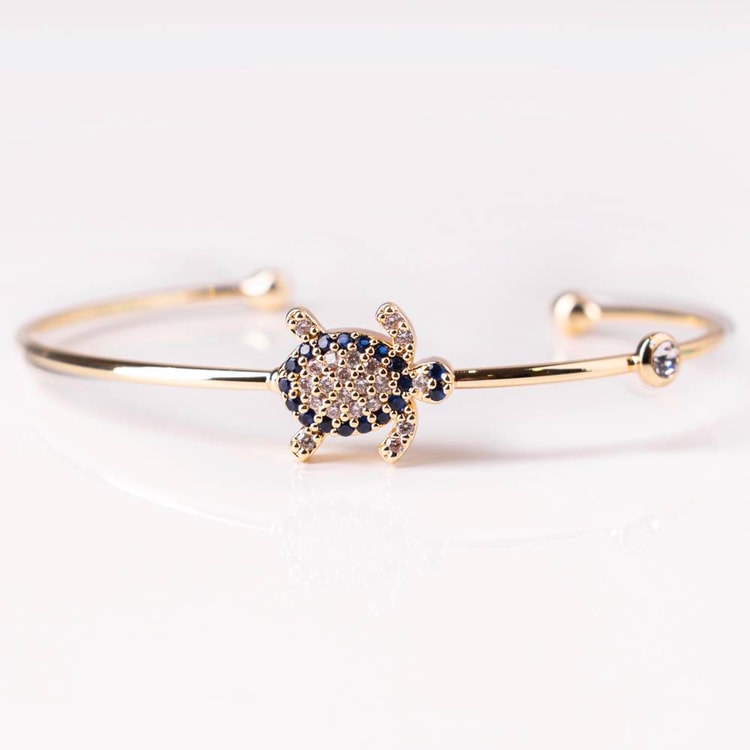 متجر الحلي | إسورة السلحفة الذهبية (في النص) Trinkets boutique- Golden
