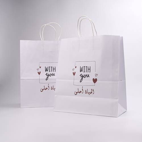 أكياس ورقية للهدايا ( معك الدنيا أحلى )  - 12 حبة