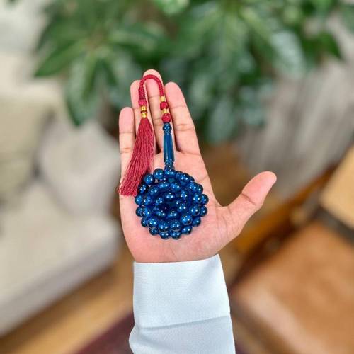 مسباح بكلايت أزرق شفاف كركوشة عنابية