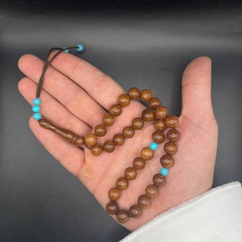 بحجر الكوك مطعمه بفصوص فيروزية