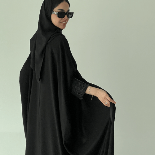 عباية بشت كريب ملكي مع شك أسود بالأكمام