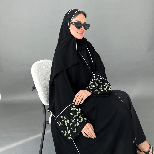 عباية بشت سوداء بتحديد وردي وأكمام شك ورود فخم (عباية اريام)
