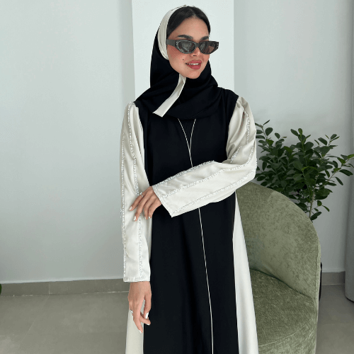 عباية كلوش بأكمام وجوانب باللون البيج مع شك يدوي على الكتف (عباية فرح بيج)